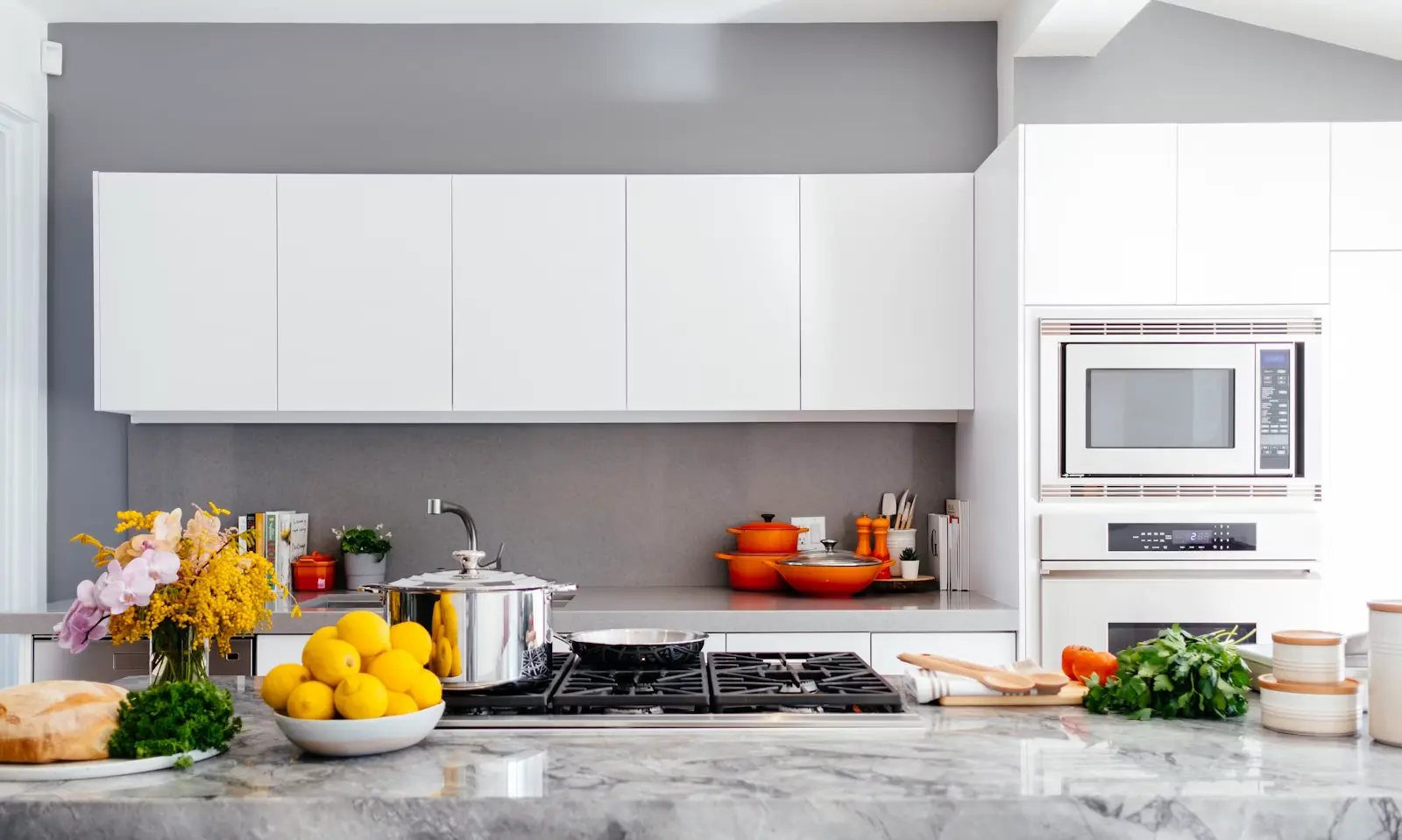 Warm modern kitchen with wood cabinetry and an island